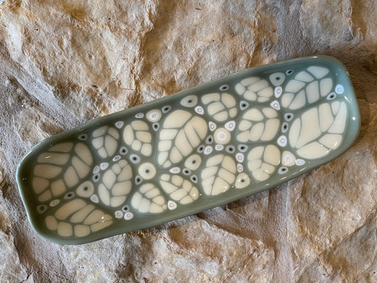 Fused glass relish tray with stylized leaves