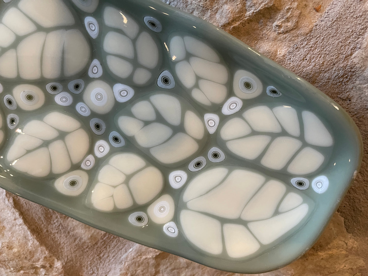 Fused glass relish tray with stylized leaves